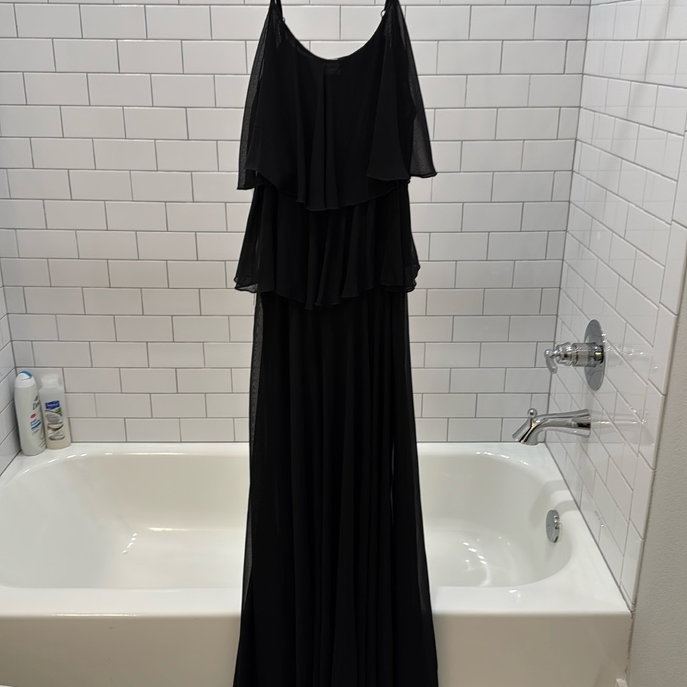Such a beautiful black flowy dress!